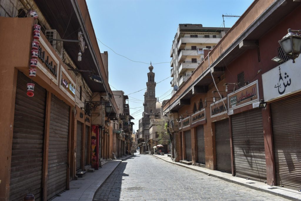 Stores were closed on Cairo’s Al-Moez Street, where the Egyptian government imposed a two-week curfew, during which all public transportation in the city was suspended.Photo: Ziad Ahmed/NurPhoto via Getty Images